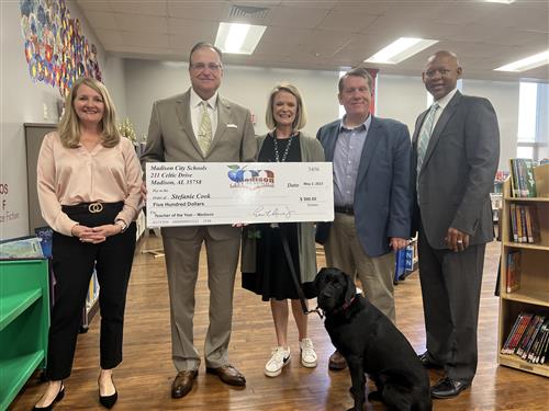 Madison Elementary TOTY Stefanie Cook with prize patrol